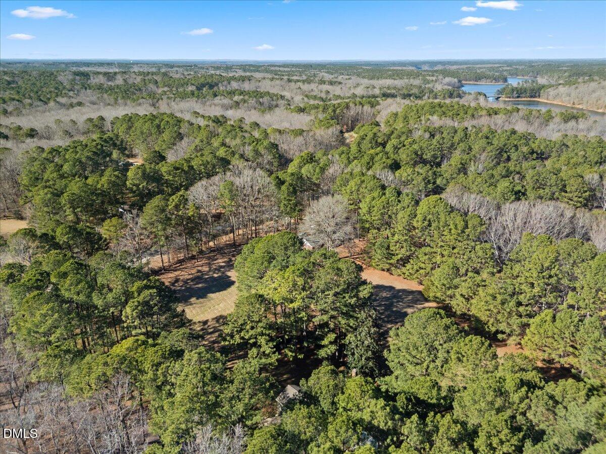 13616 New Light Road Raleigh, NC 27614 - Photo 55 of 60 a view of a city with lush green forest