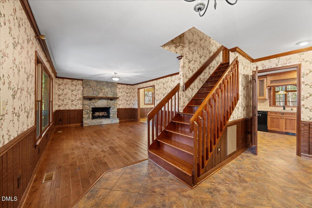 13616 New Light Road Raleigh, NC 27614 - Photo 6 of 60 a view of entryway and hall with wooden floor
