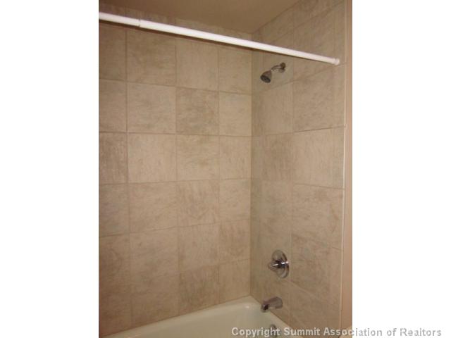 108 Guller Road, Unit A5 Frisco, CO 80443 - Photo 10 of 25 Bathroom. Bathroom #1 has a beautiful tile surround.