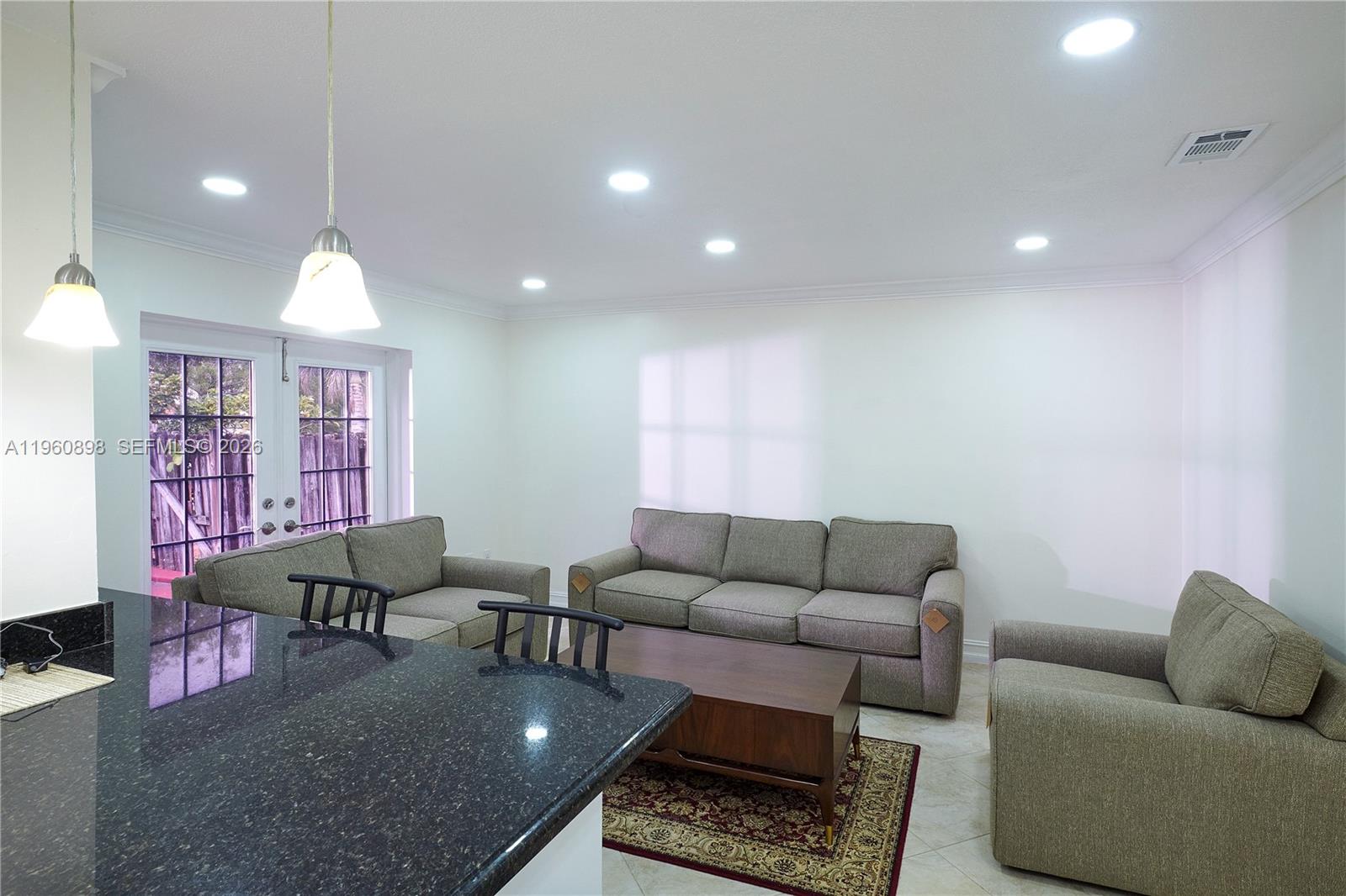 20030 Northwest 83rd Court Hialeah, FL 33015 - Photo 12 of 33 a living room with furniture