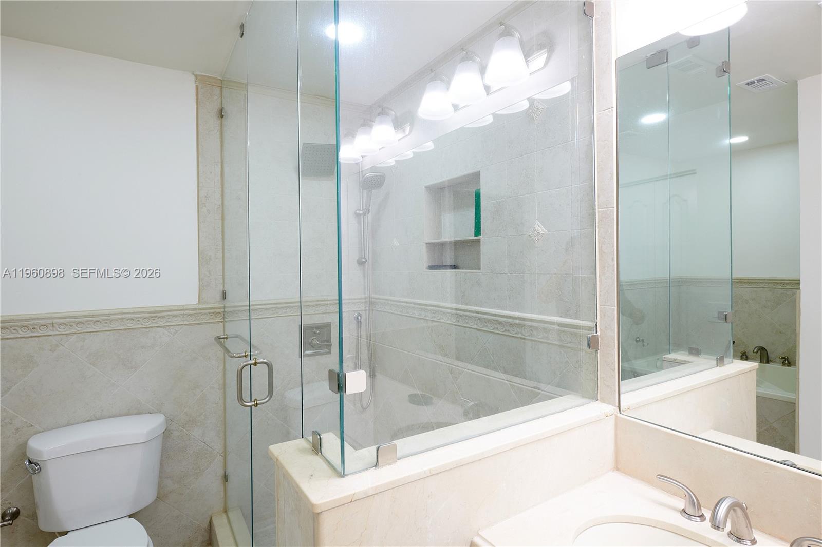 20030 Northwest 83rd Court Hialeah, FL 33015 - Photo 22 of 33 a bathroom with a bathtub and a shower