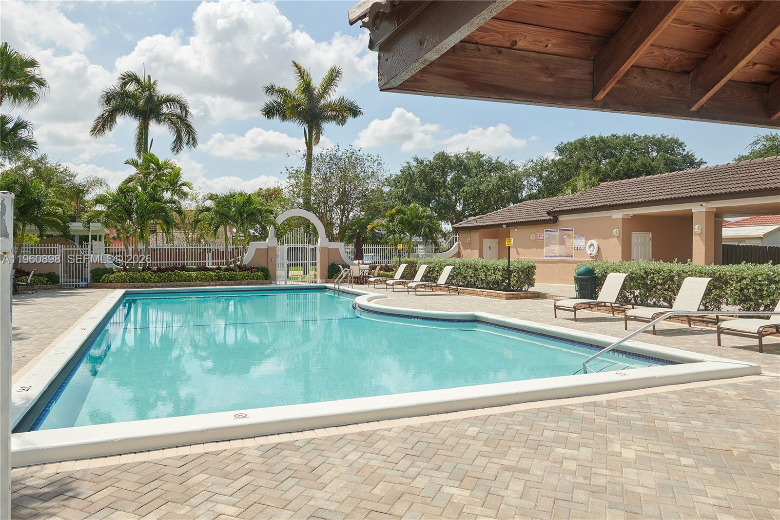 20030 Northwest 83rd Court Hialeah, FL 33015 - Photo 30 of 33 a view of a patio with swimming pool