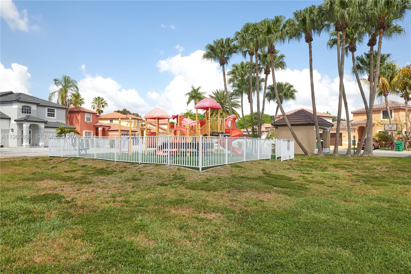 20030 Northwest 83rd Court Hialeah, FL 33015 - Photo 33 of 33 a view of a yard with a fountain