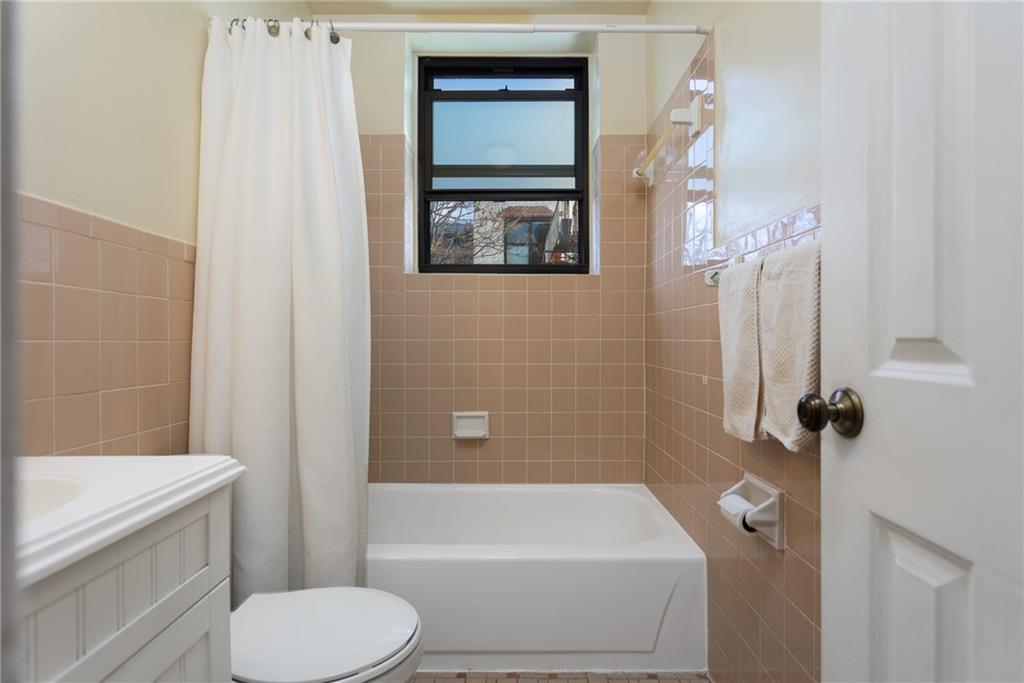 68 Stratford Road, Unit 7 Brooklyn, NY 11218 - Photo 11 of 13 a bathroom with a toilet and a shower