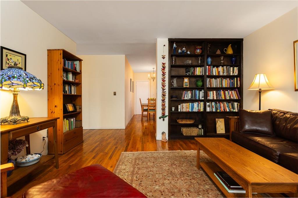 68 Stratford Road, Unit 7 Brooklyn, NY 11218 - Photo 7 of 13 a living room with furniture and wooden floor