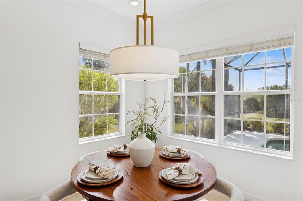 14614 Newtonmore Lane Lakewood Ranch, FL 34202 - Photo 20 of 72 a living room with furniture and a window