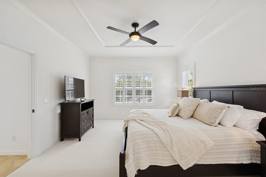 14614 Newtonmore Lane Lakewood Ranch, FL 34202 - Photo 28 of 72 a bedroom with a bed and window
