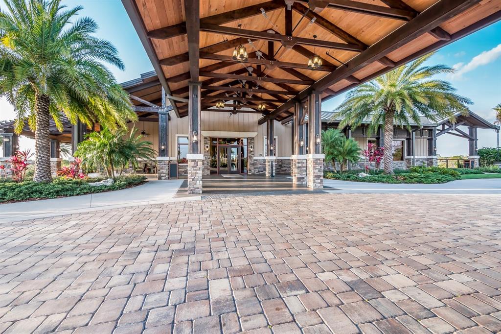 14614 Newtonmore Lane Lakewood Ranch, FL 34202 - Photo 51 of 72 a view of a building with a patio