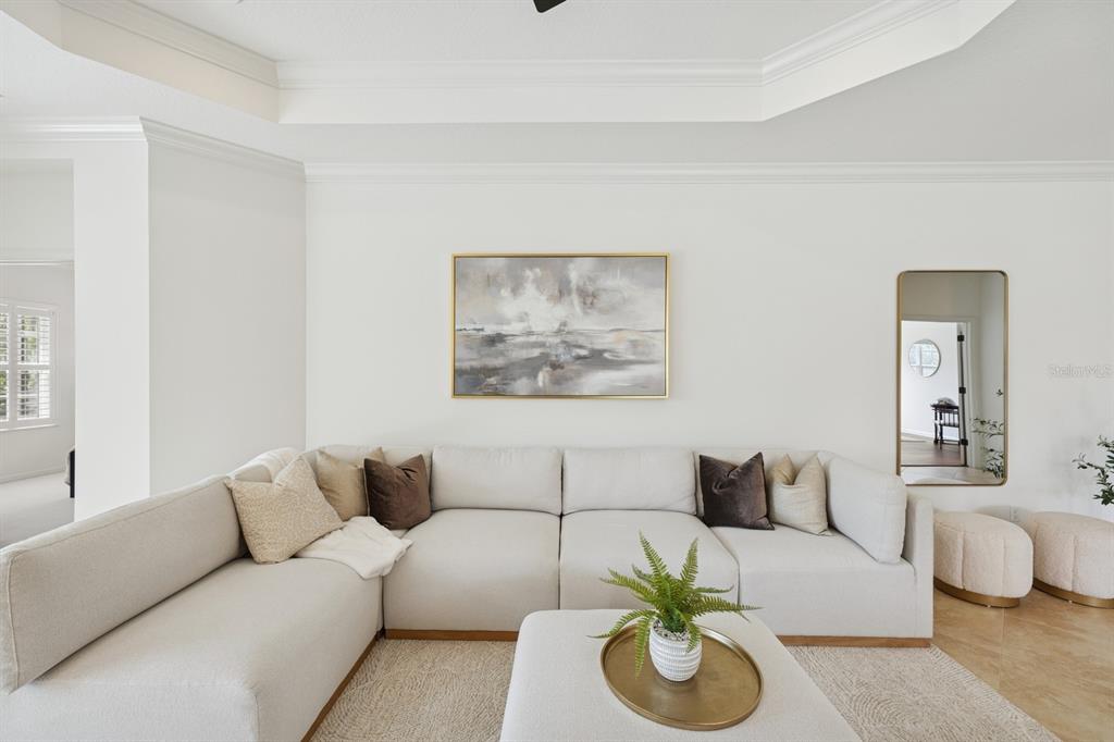 14614 Newtonmore Lane Lakewood Ranch, FL 34202 - Photo 10 of 72 a living room with furniture and a couch