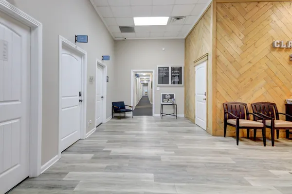 a view of a livingroom with furniture and furniture