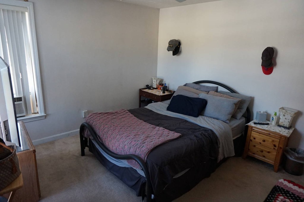 16 Waring Road Natick, MA 01760 - Photo 12 of 12 a bedroom with a bed and a window