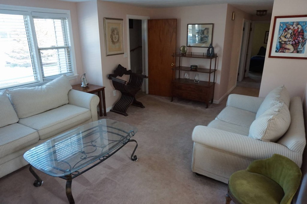16 Waring Road Natick, MA 01760 - Photo 2 of 12 a living room with furniture and a window