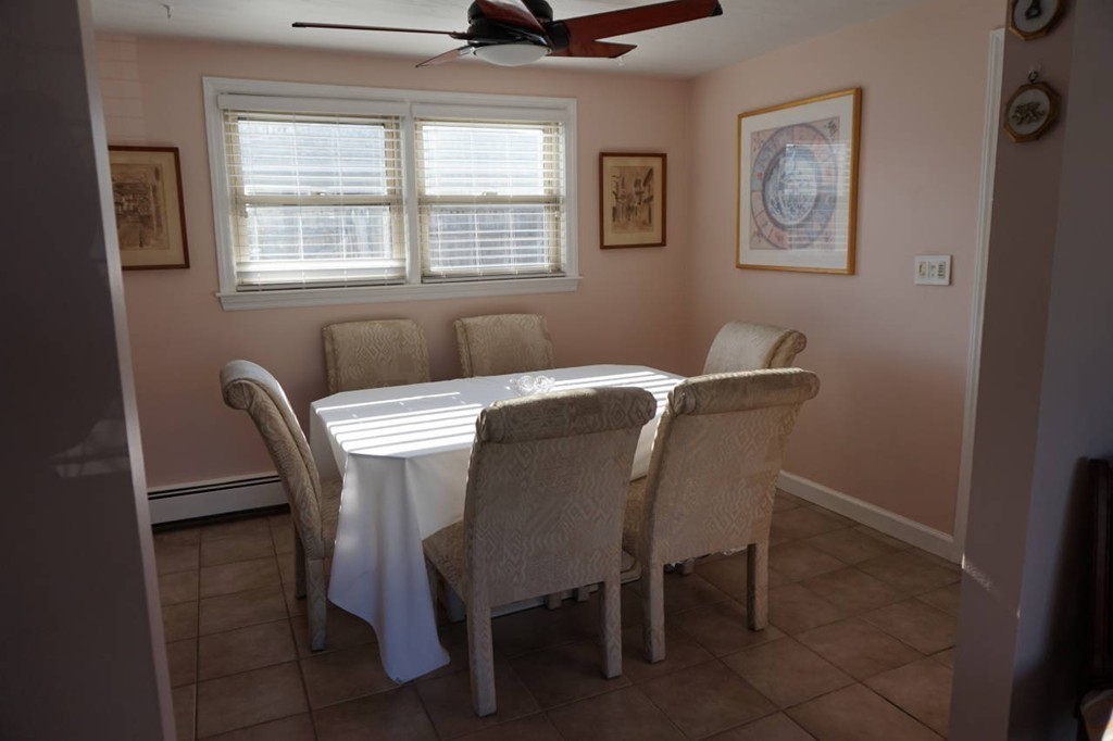 16 Waring Road Natick, MA 01760 - Photo 4 of 12 a view of a dining room with furniture and a window