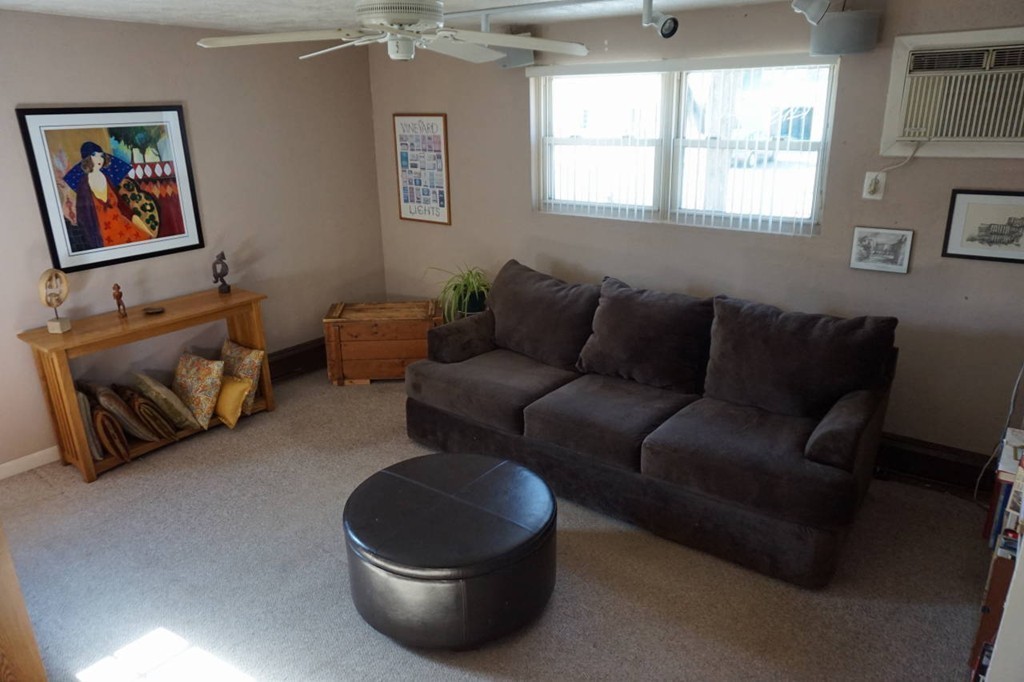 16 Waring Road Natick, MA 01760 - Photo 7 of 12 a living room with furniture and a window