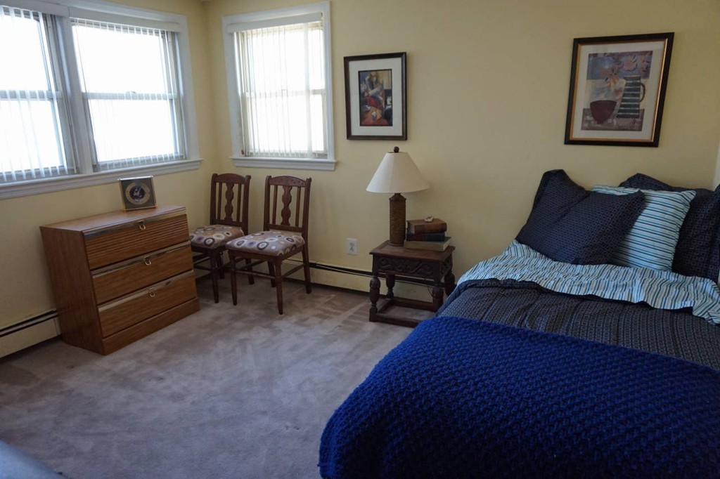 16 Waring Road Natick, MA 01760 - Photo 10 of 12 a living room with furniture and a window