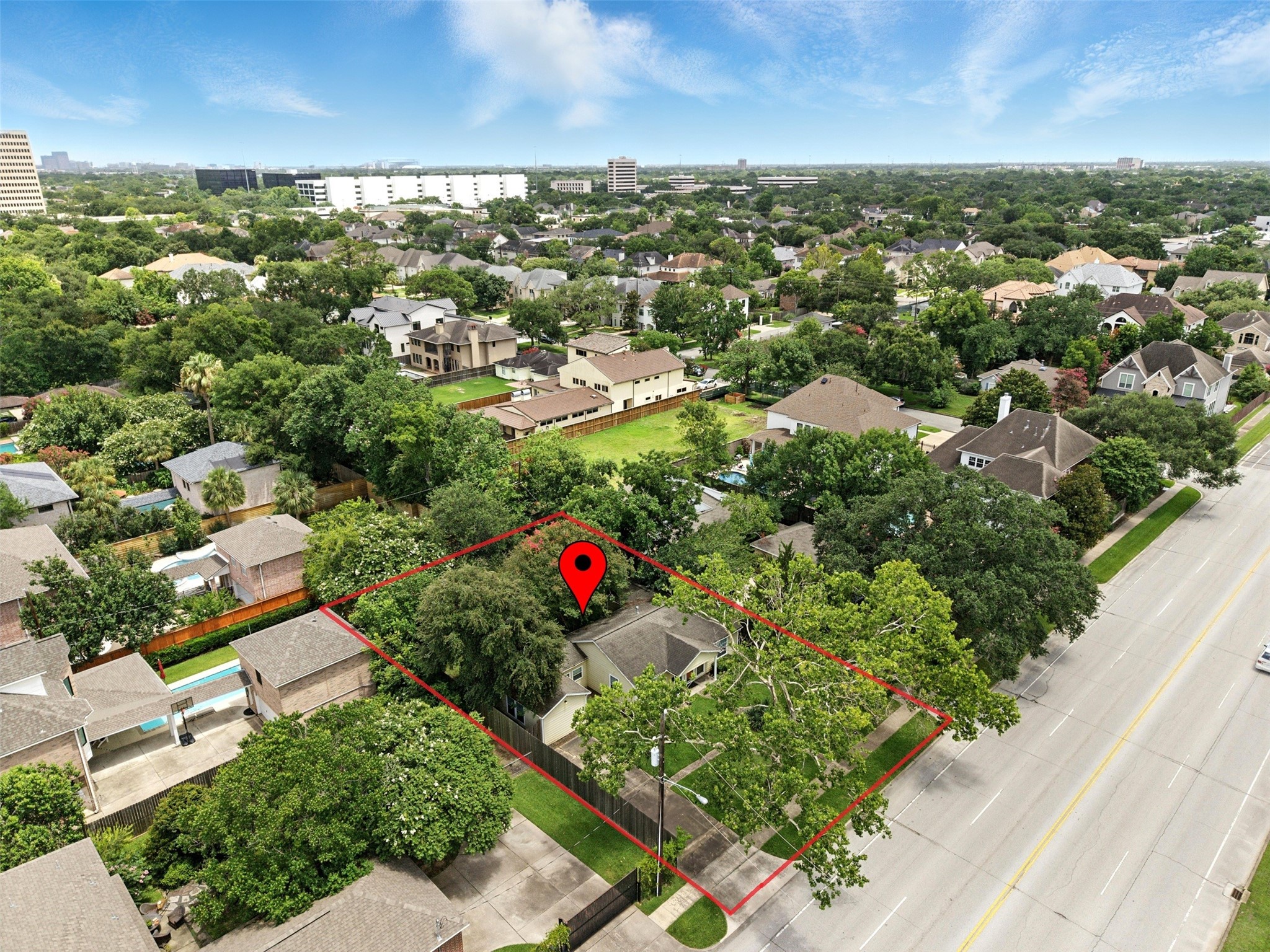 6305 South Rice Avenue Bellaire, TX 77401 - Photo 14 of 23 an aerial view of residential houses with outdoor space and trees