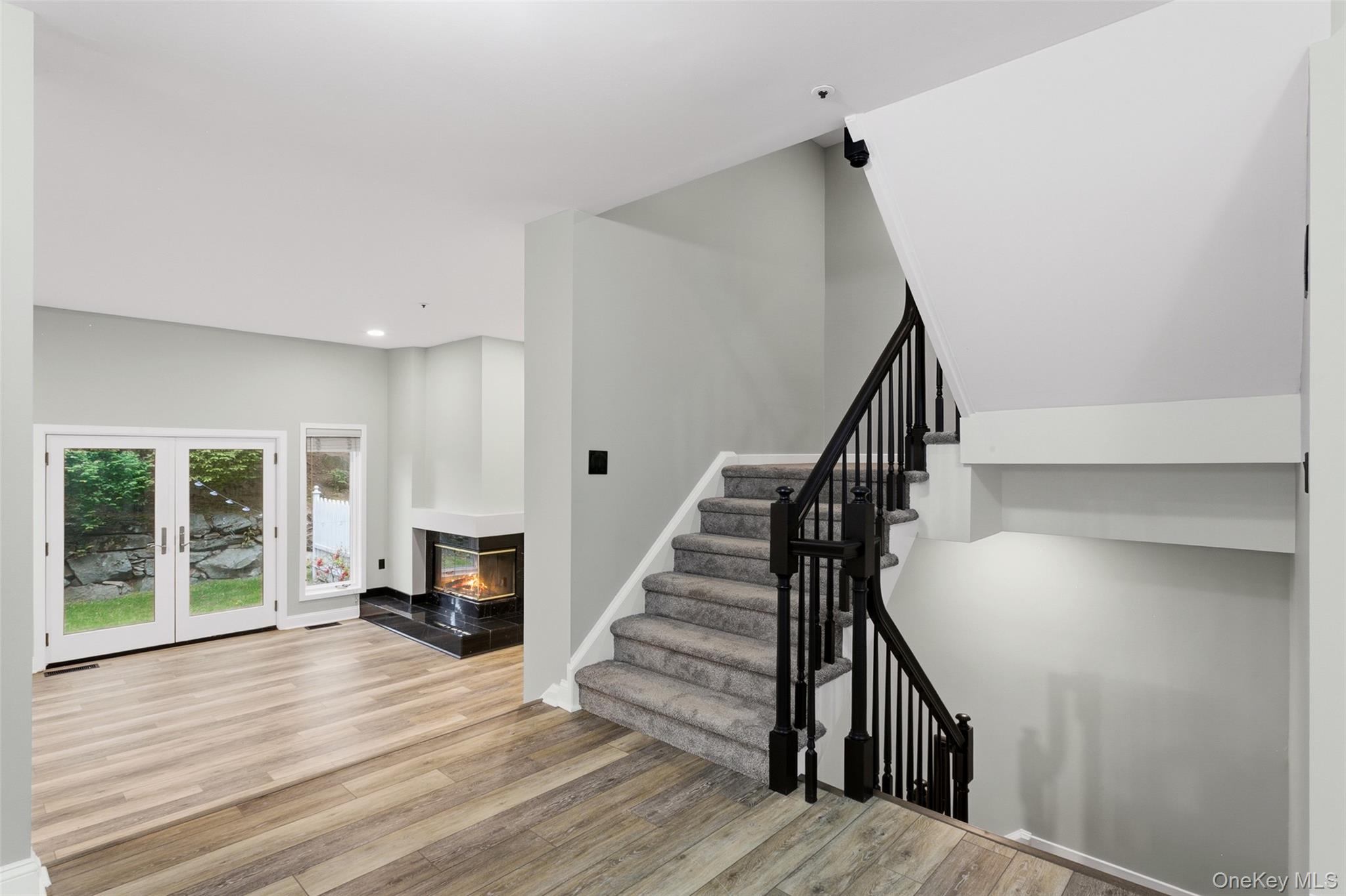135 Boulder Ridge Road, Unit E87 Scarsdale, NY 10583 - Photo 15 of 47 a view of entryway and hall with wooden floor