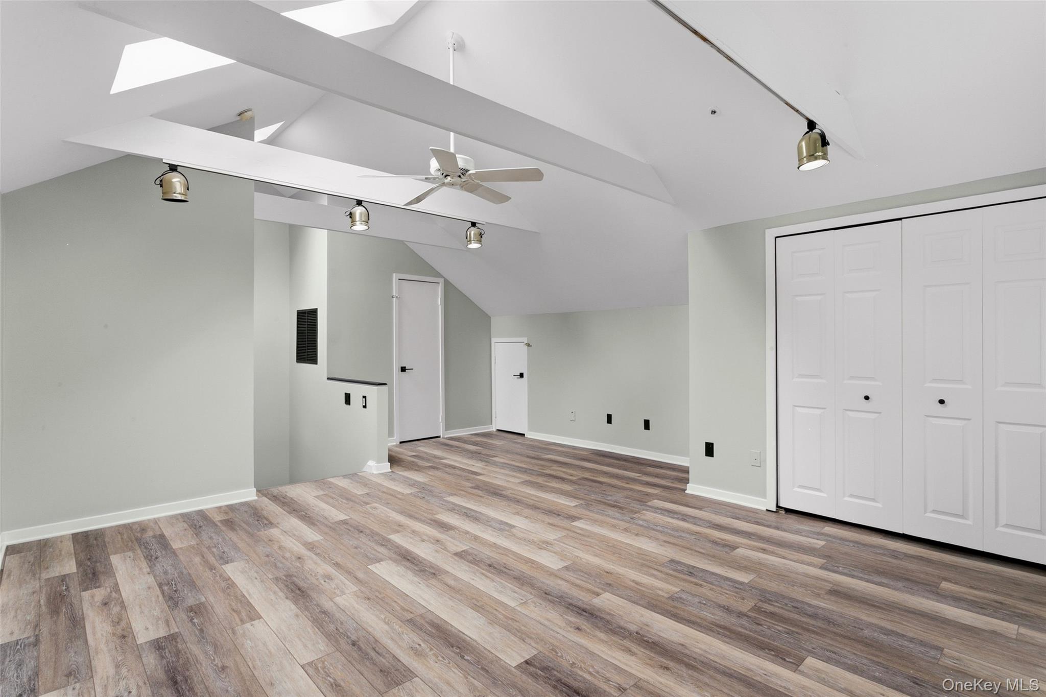 135 Boulder Ridge Road, Unit E87 Scarsdale, NY 10583 - Photo 33 of 47 a view of a room with cabinet and wooden floor