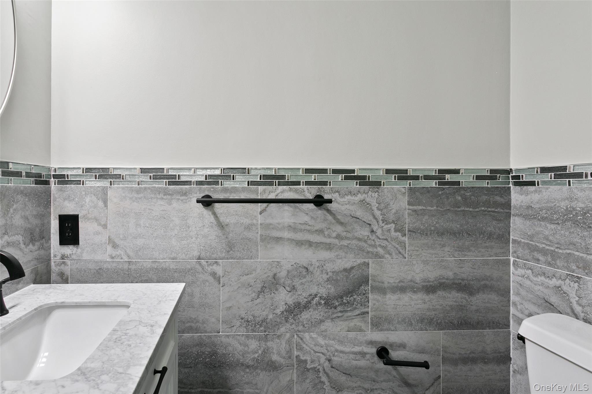 135 Boulder Ridge Road, Unit E87 Scarsdale, NY 10583 - Photo 41 of 47 a bathroom with a granite countertop bathtub shower and toilet