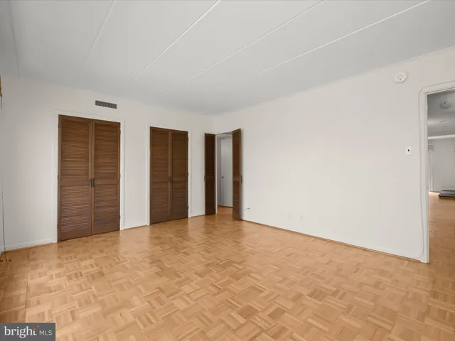 an empty room with closet