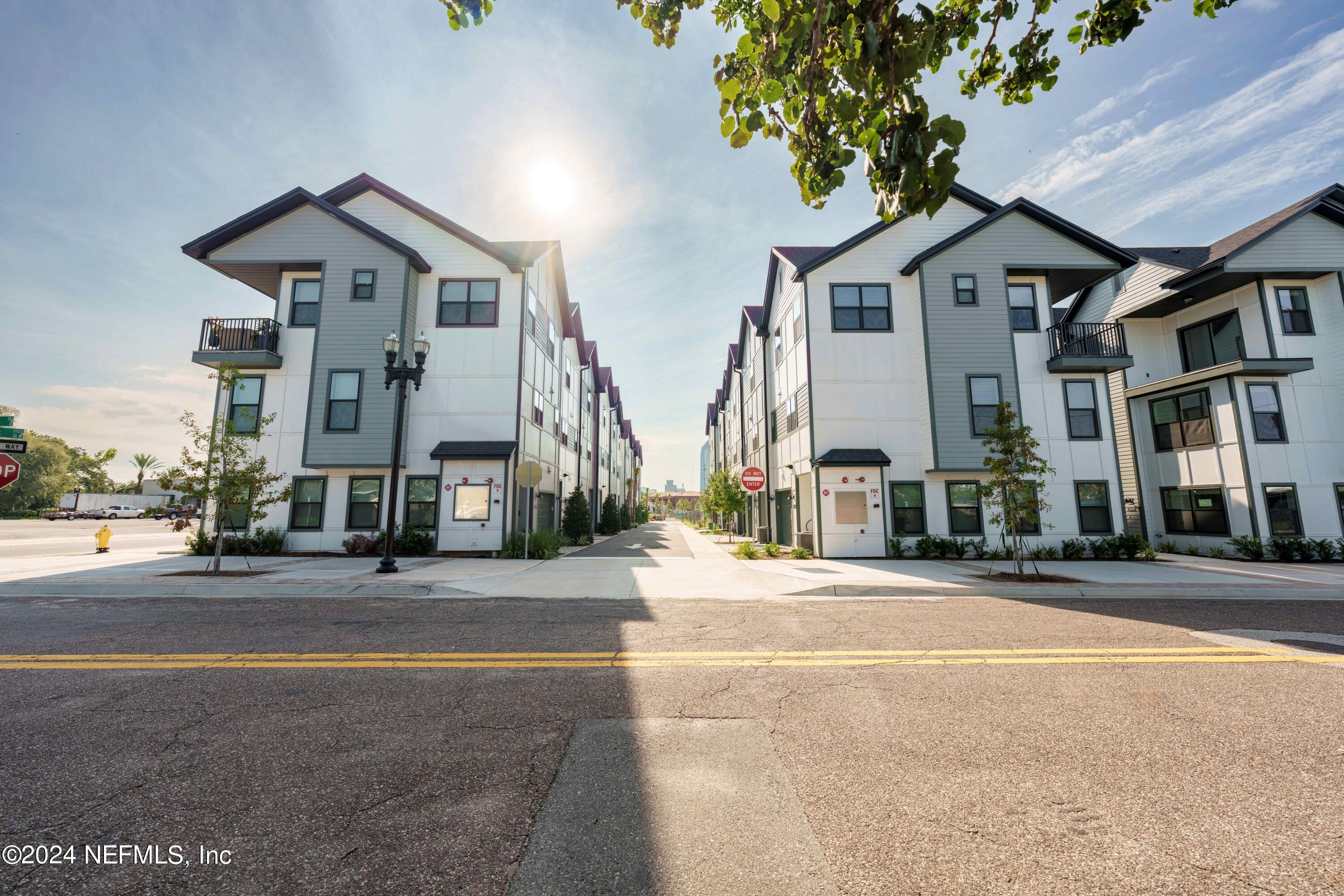 161 Barstow Place Jacksonville, FL 32204 - Photo 3 of 39 a front view of a building with street view