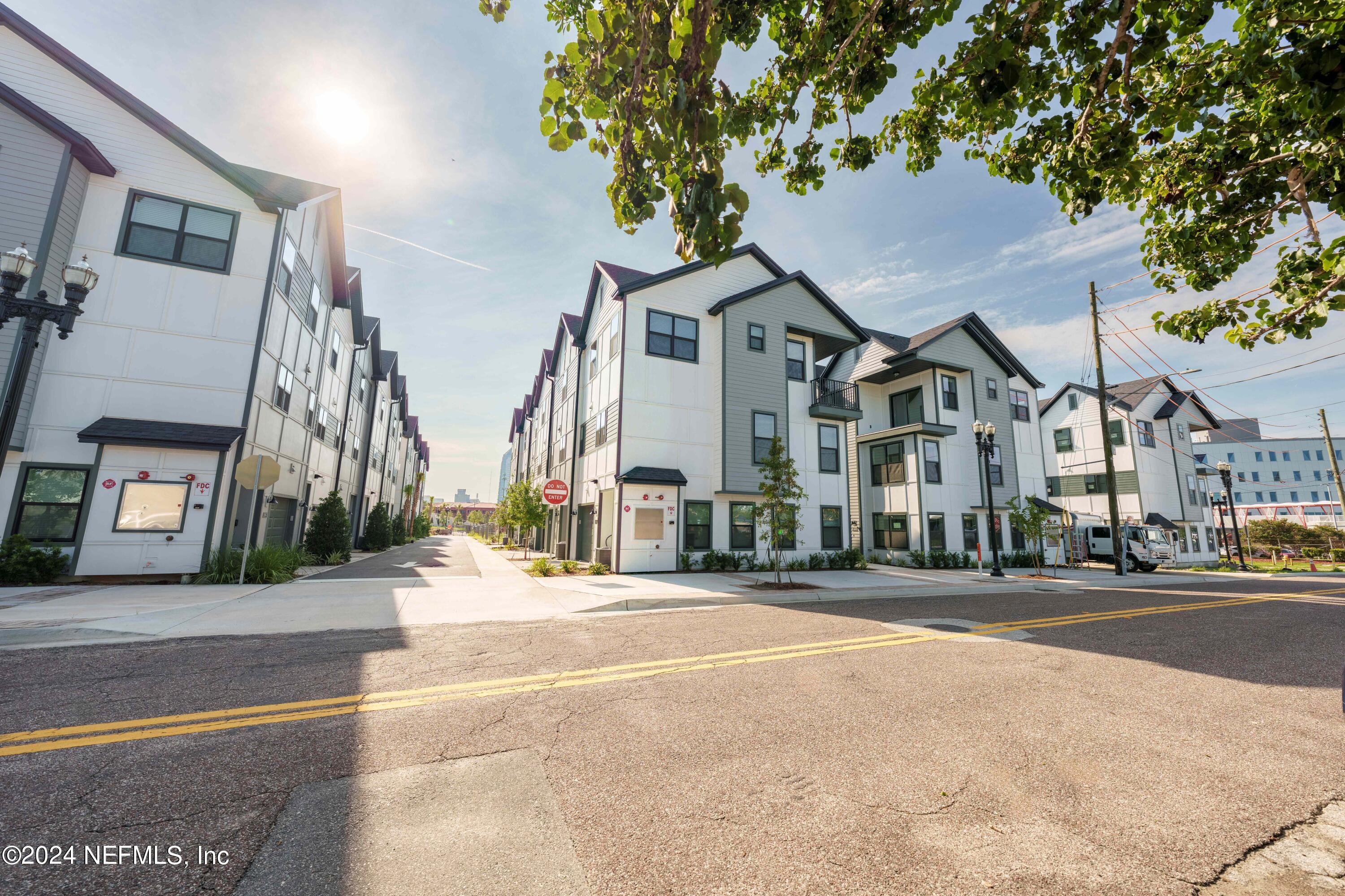 161 Barstow Place Jacksonville, FL 32204 - Photo 4 of 39 a front view of a building with street view