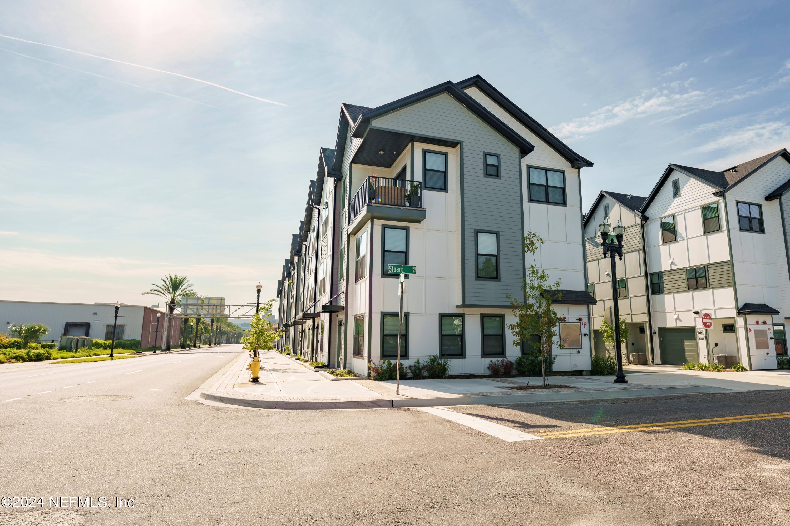 161 Barstow Place Jacksonville, FL 32204 - Photo 5 of 39 a front view of a building with a street