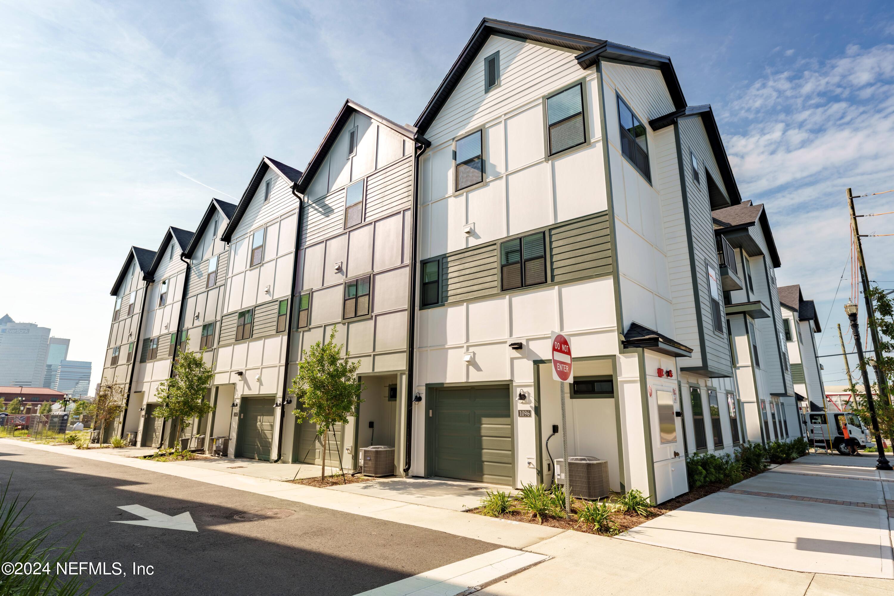 161 Barstow Place Jacksonville, FL 32204 - Photo 6 of 39 a view of a building along the street
