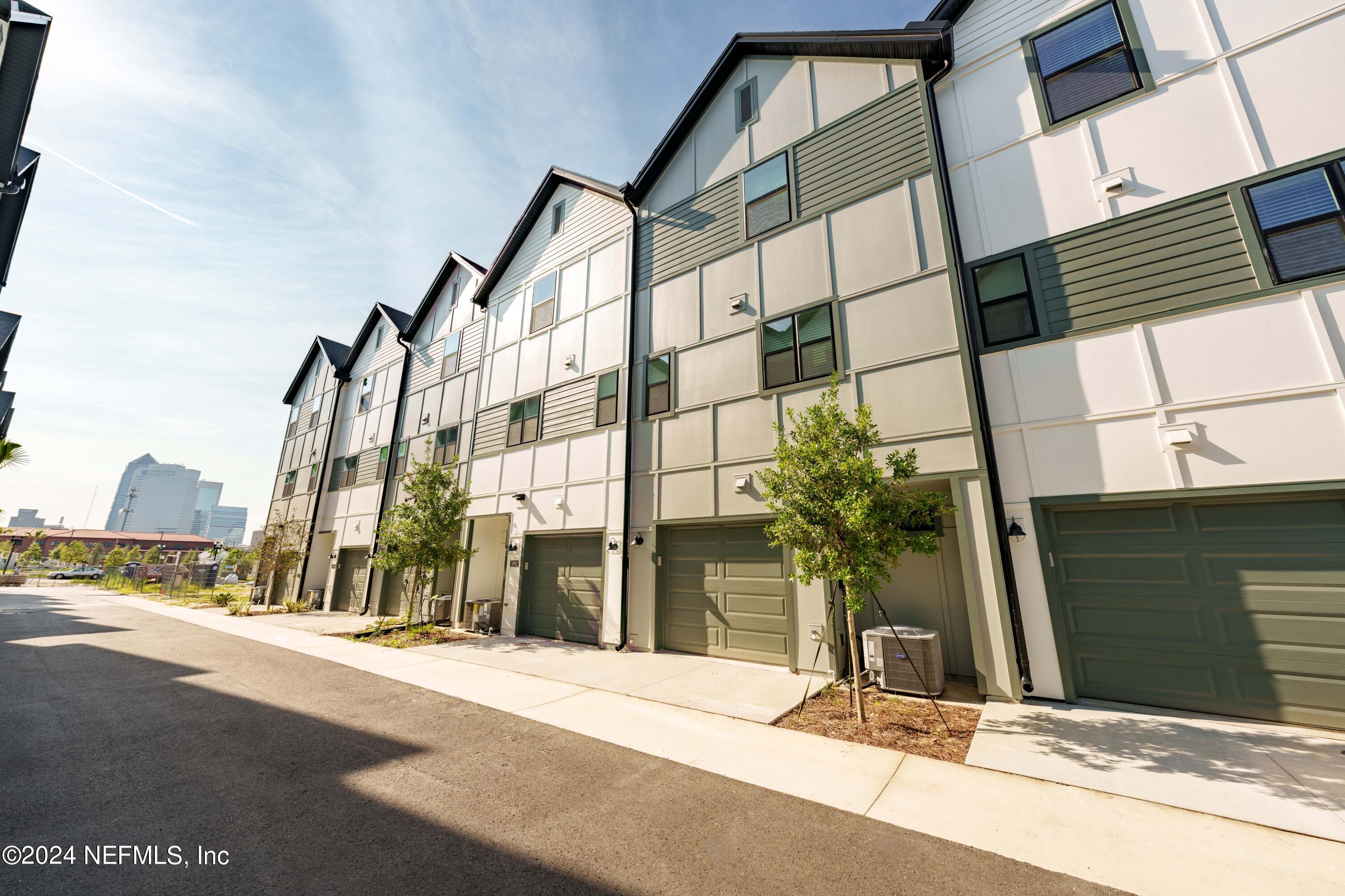 161 Barstow Place Jacksonville, FL 32204 - Photo 7 of 39 a view of a building along the street