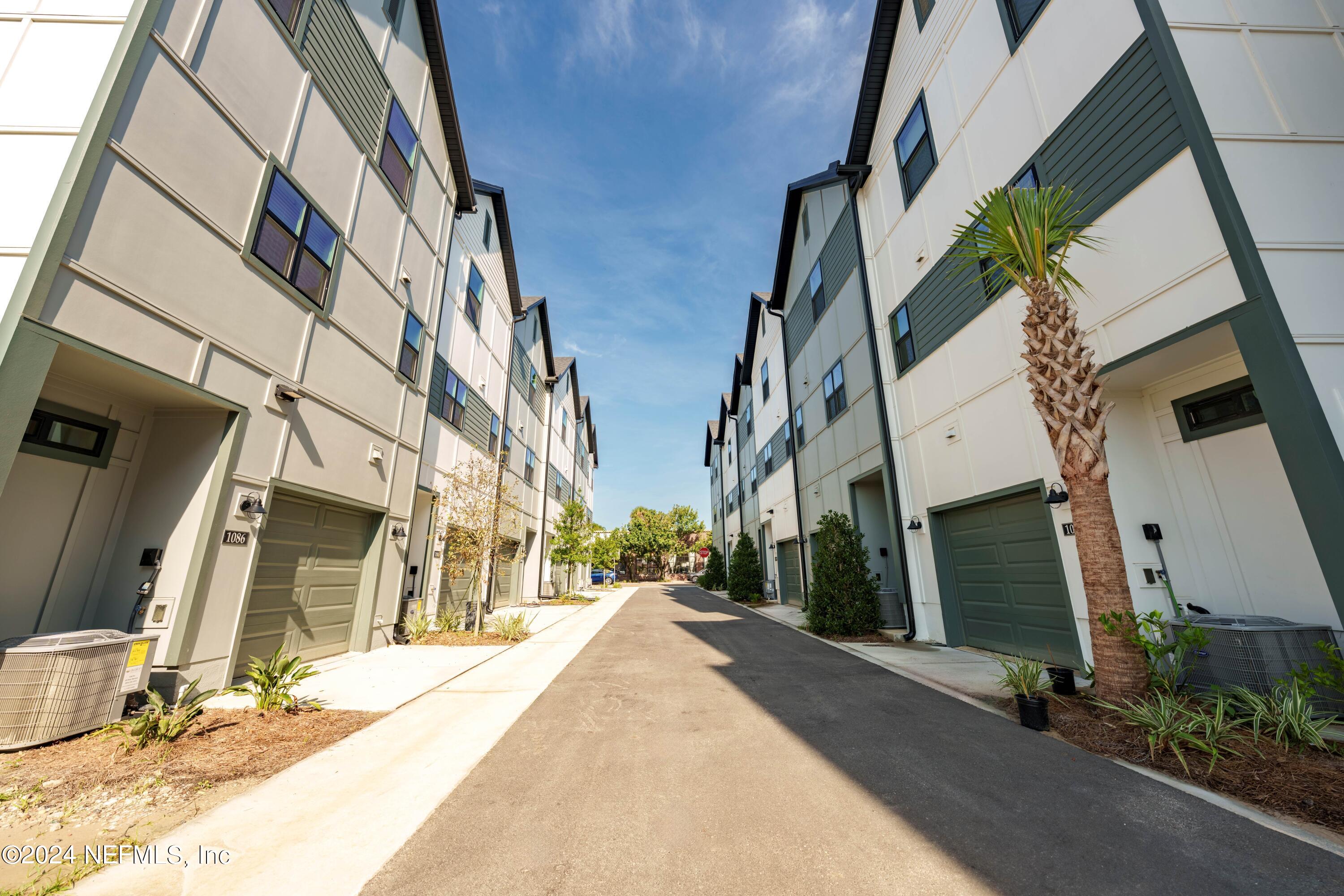 161 Barstow Place Jacksonville, FL 32204 - Photo 10 of 39 a view of a building along the street