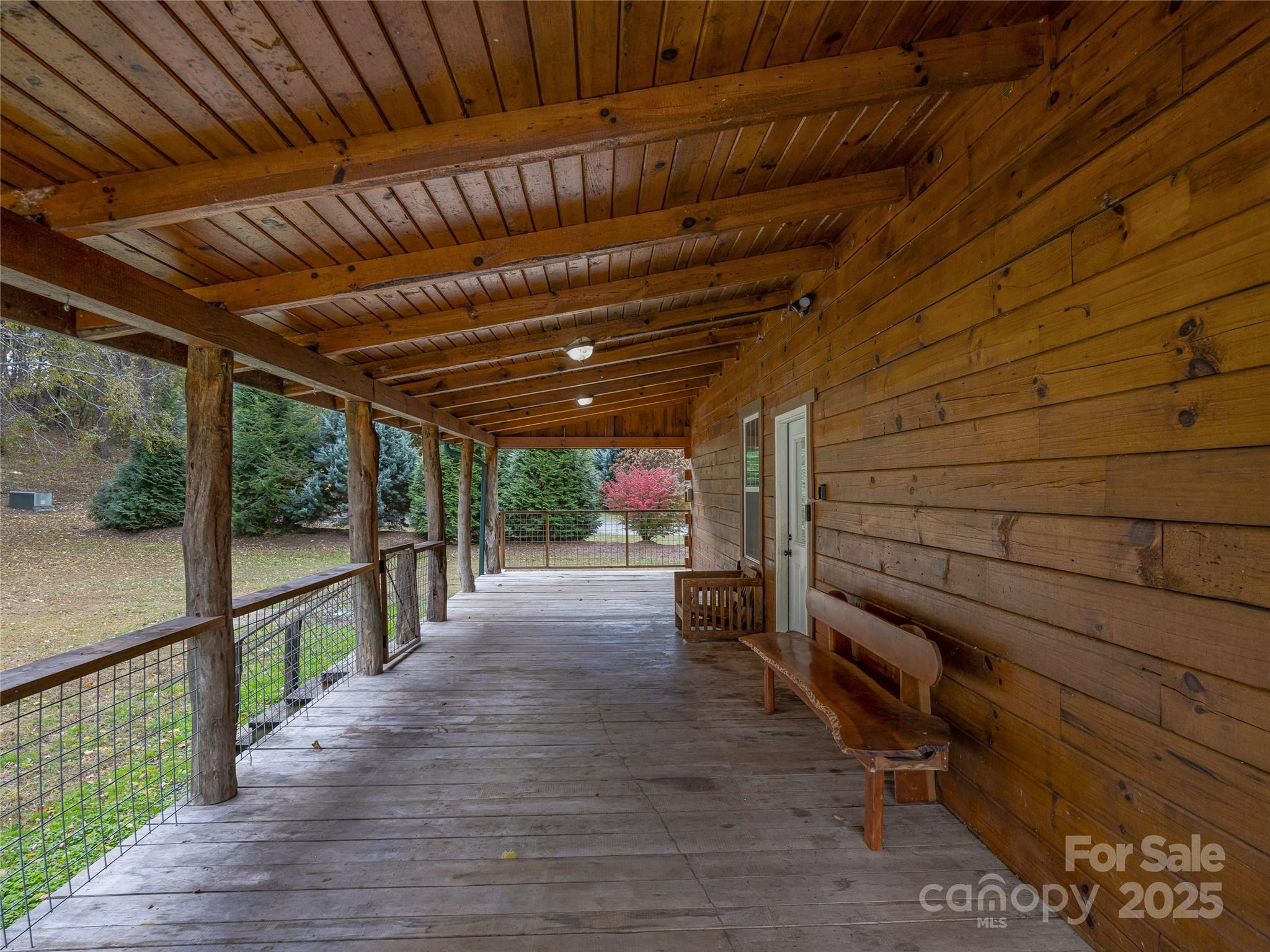 1640-1641 River Road Hot Springs, NC 28743 - Photo 39 of 48 a view of a patio with wooden floor