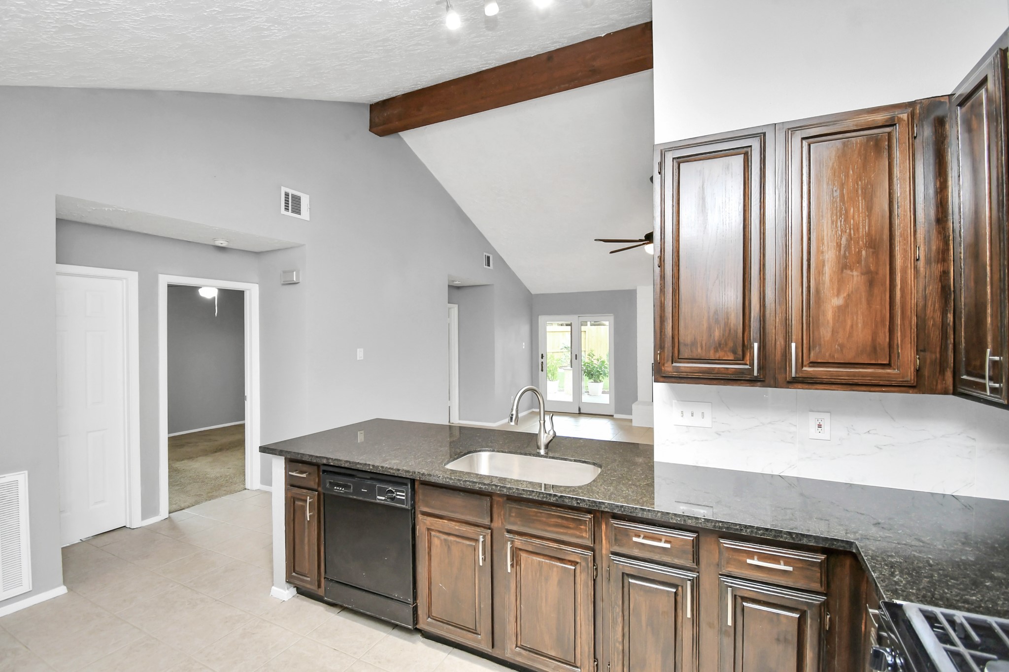 10219 Trading Post Drive Houston, TX 77064 - Photo 15 of 39 a bathroom with a granite countertop sink and a mirror