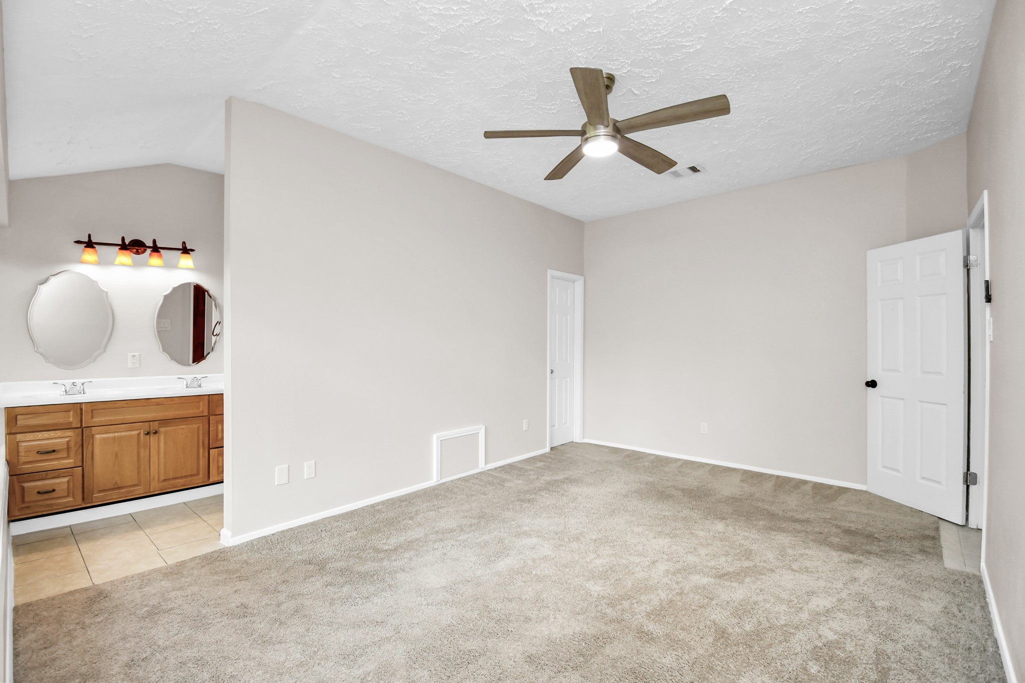 10219 Trading Post Drive Houston, TX 77064 - Photo 22 of 39 a view of a livingroom with wooden cabinets