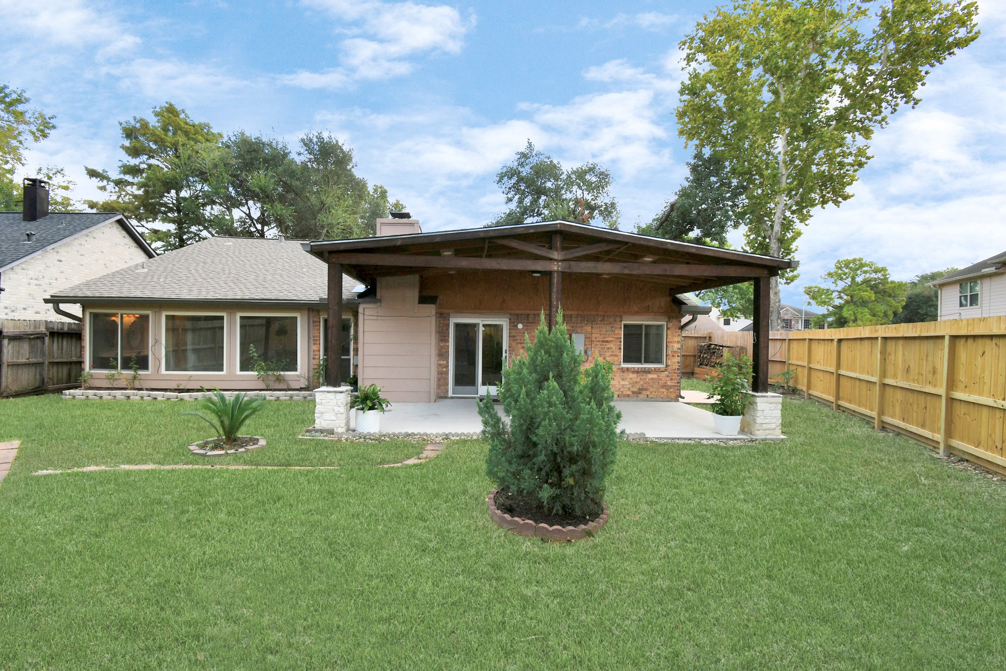 10219 Trading Post Drive Houston, TX 77064 - Photo 33 of 39 a front view of a house with a yard