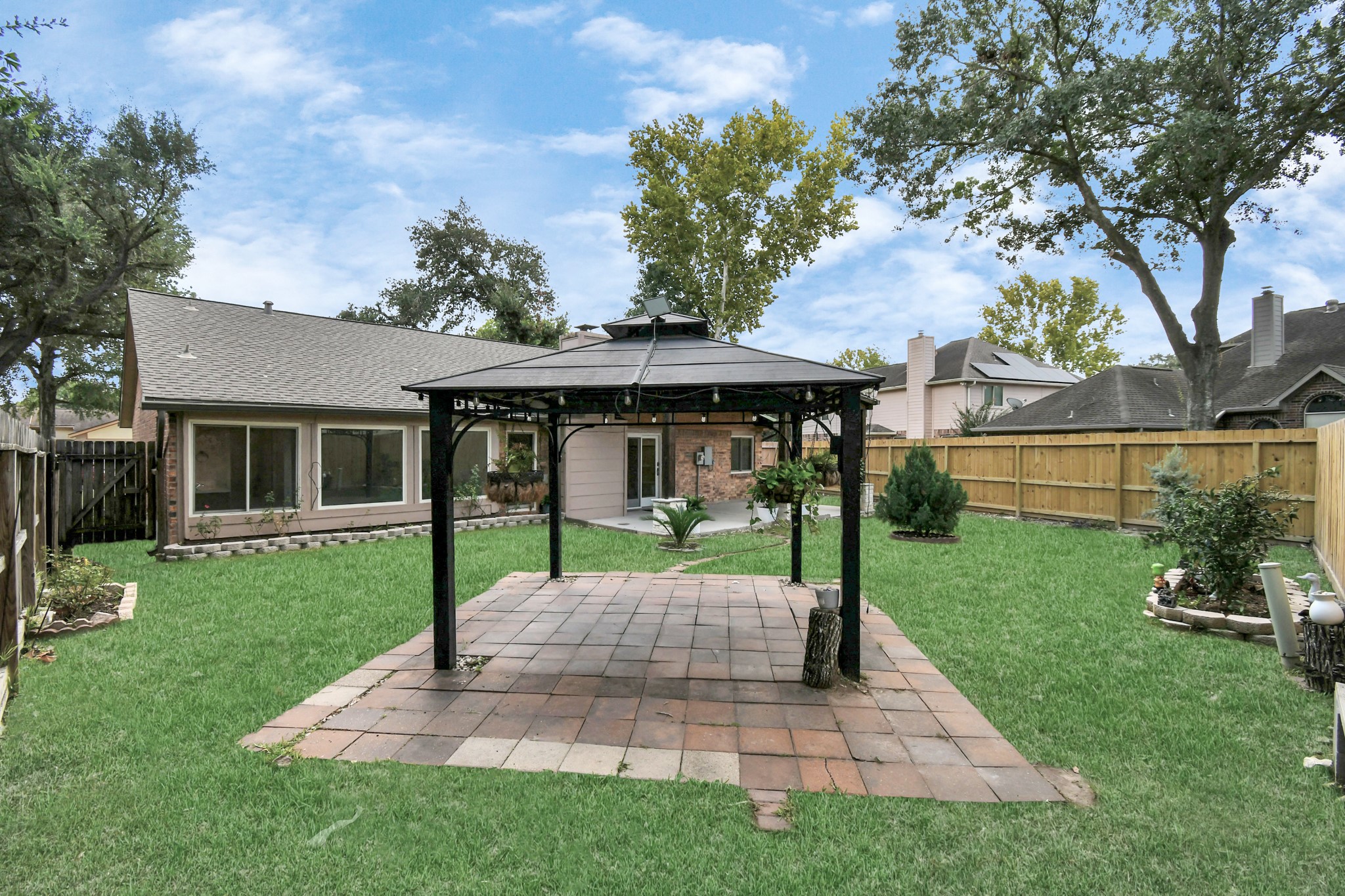 10219 Trading Post Drive Houston, TX 77064 - Photo 36 of 39 a view of a house with a yard porch and sitting area