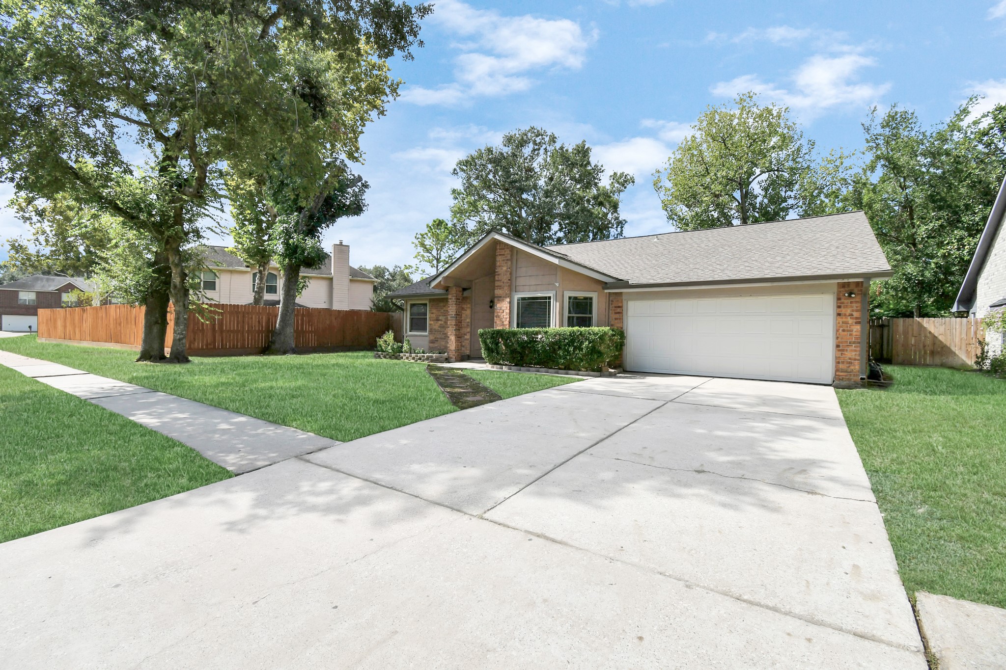 10219 Trading Post Drive Houston, TX 77064 - Photo 37 of 39 a view of house with a yard and potted plants