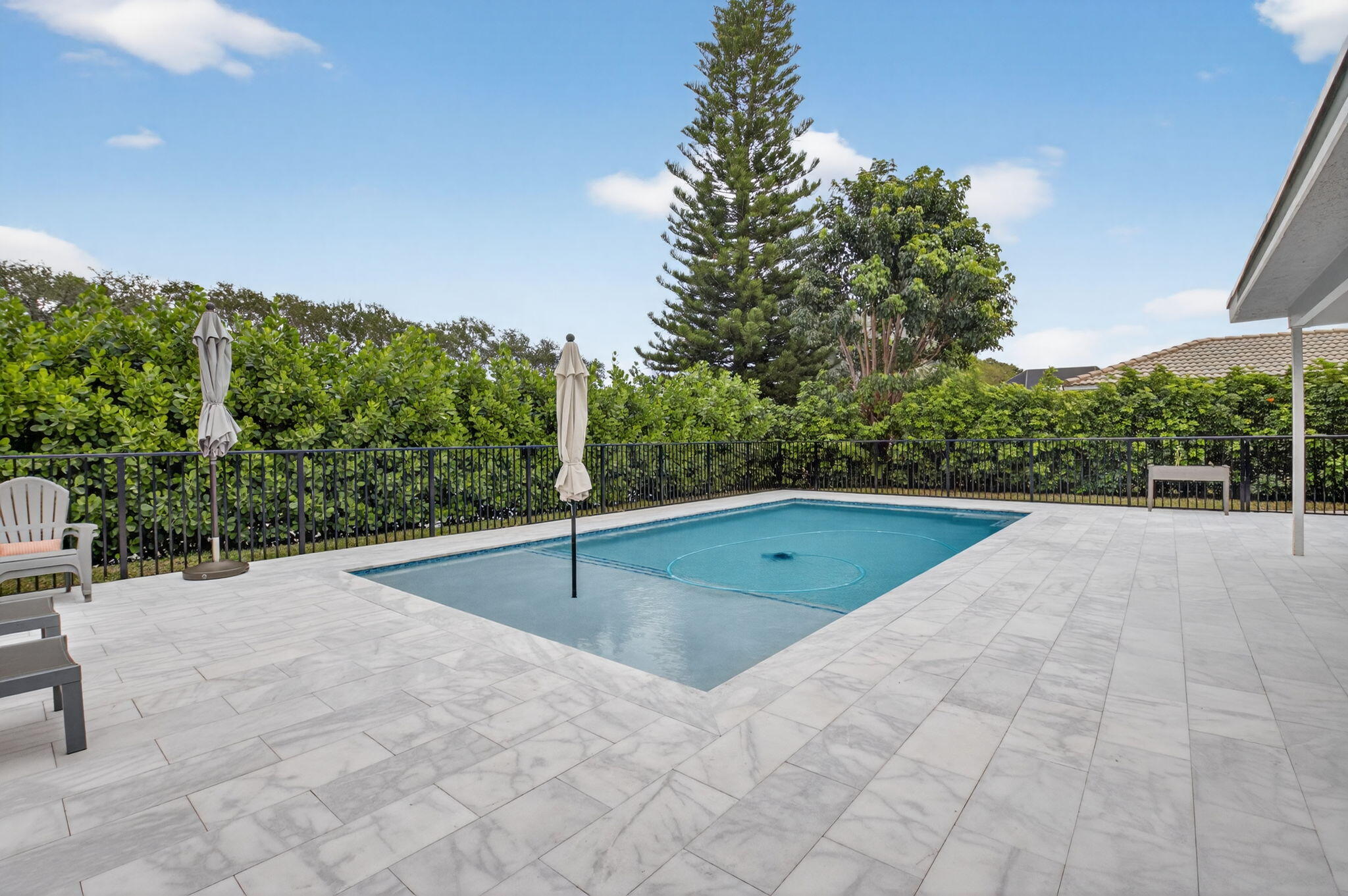 10302 Crosswind Road Boca Raton, FL 33498 - Photo 14 of 27 a view of outdoor space and swimming pool