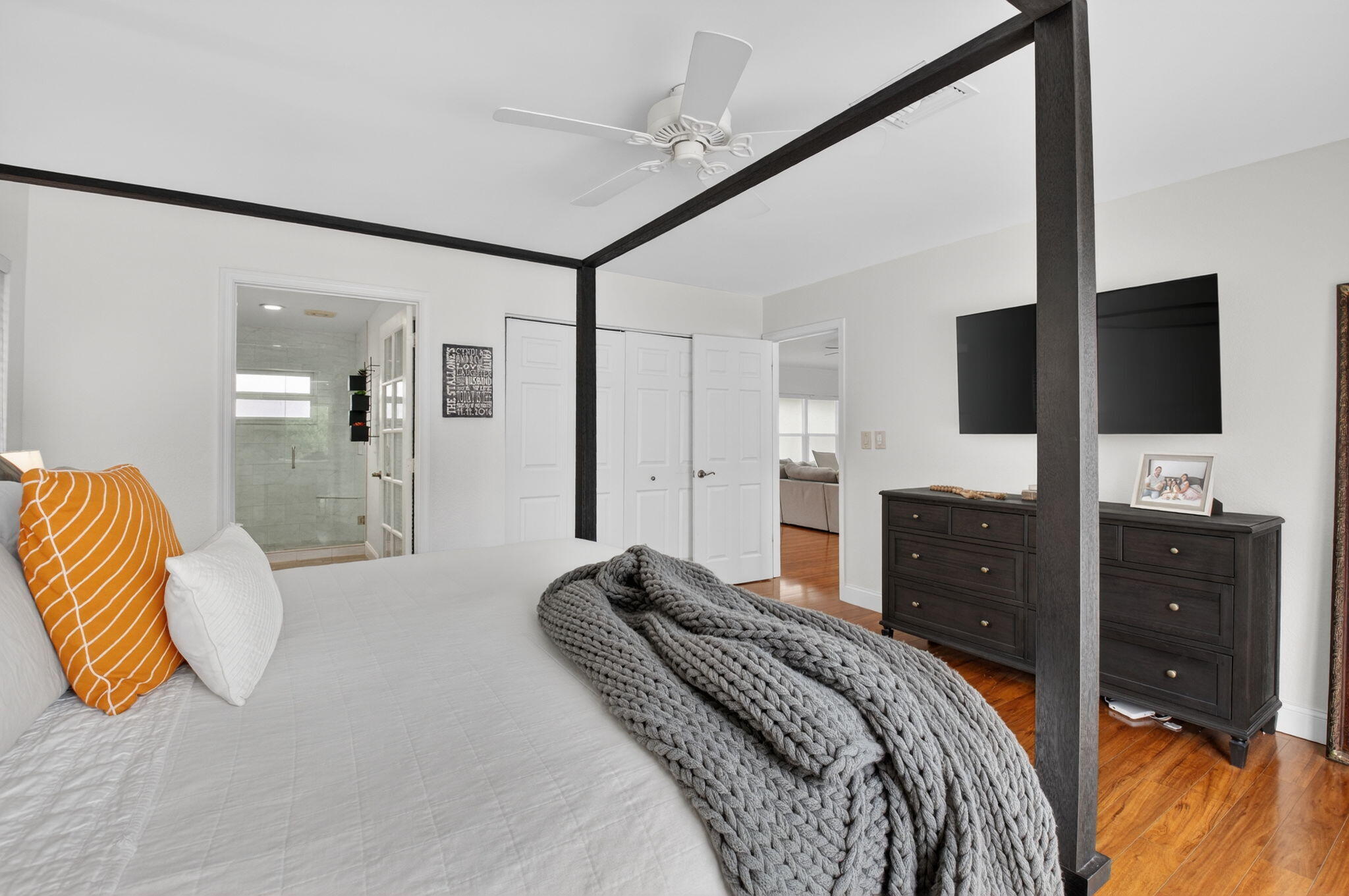 10302 Crosswind Road Boca Raton, FL 33498 - Photo 18 of 27 a bedroom with a bed and a television