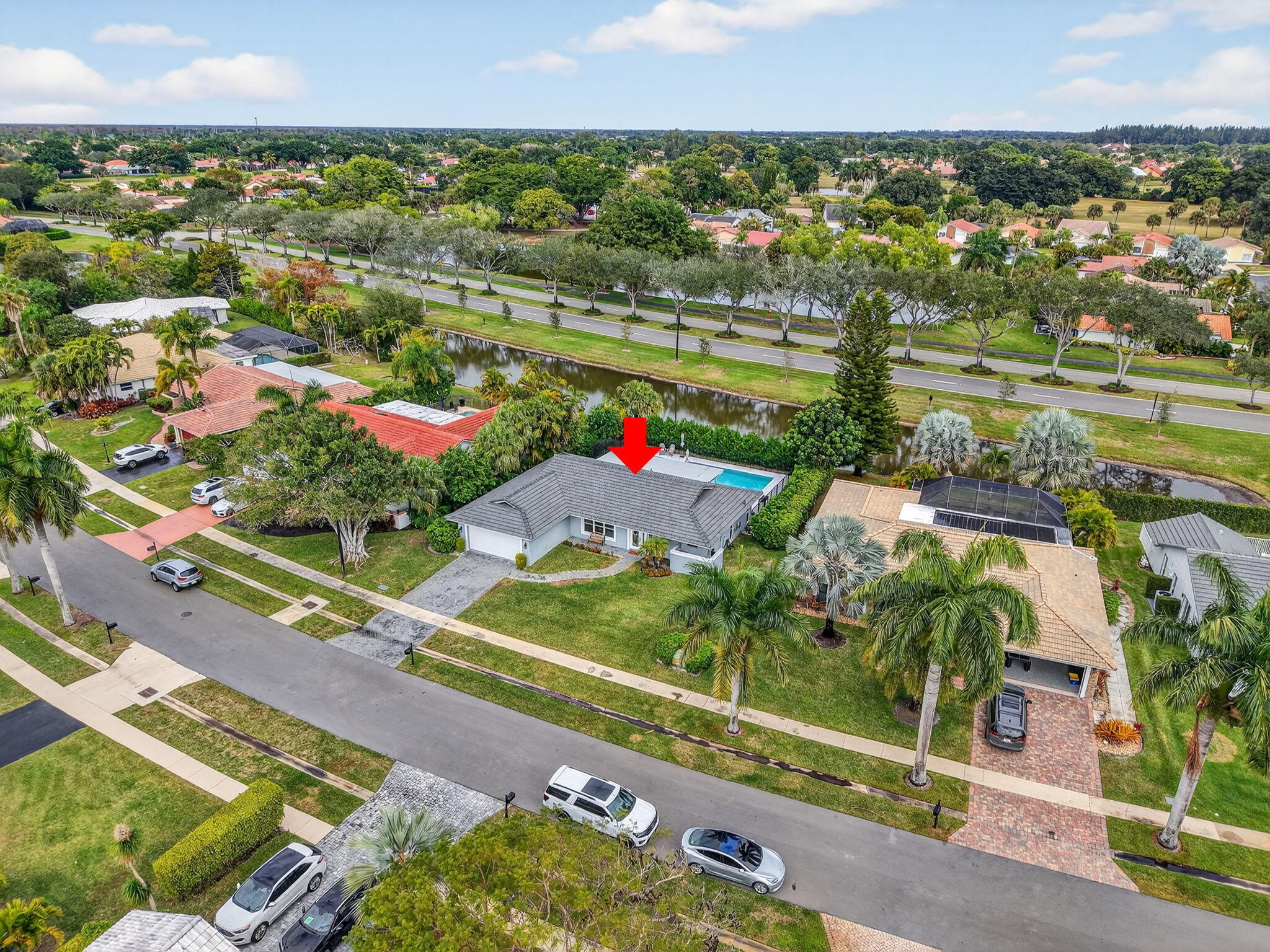 10302 Crosswind Road Boca Raton, FL 33498 - Photo 26 of 27 an aerial view of residential houses and outdoor space