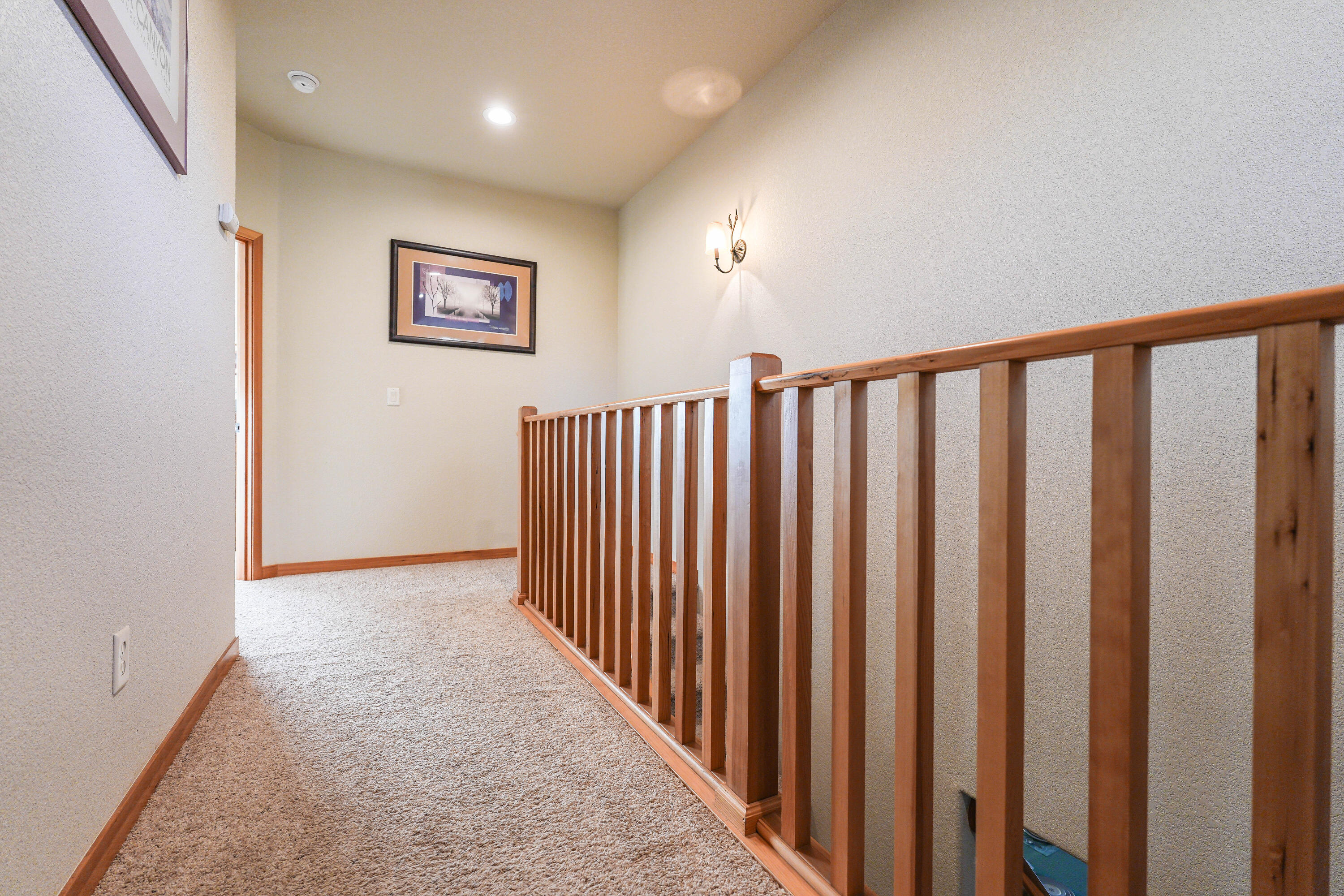 5028 Sora Loop Klamath Falls, OR 97601 - Photo 39 of 62 a view of a hallway with wooden floor
