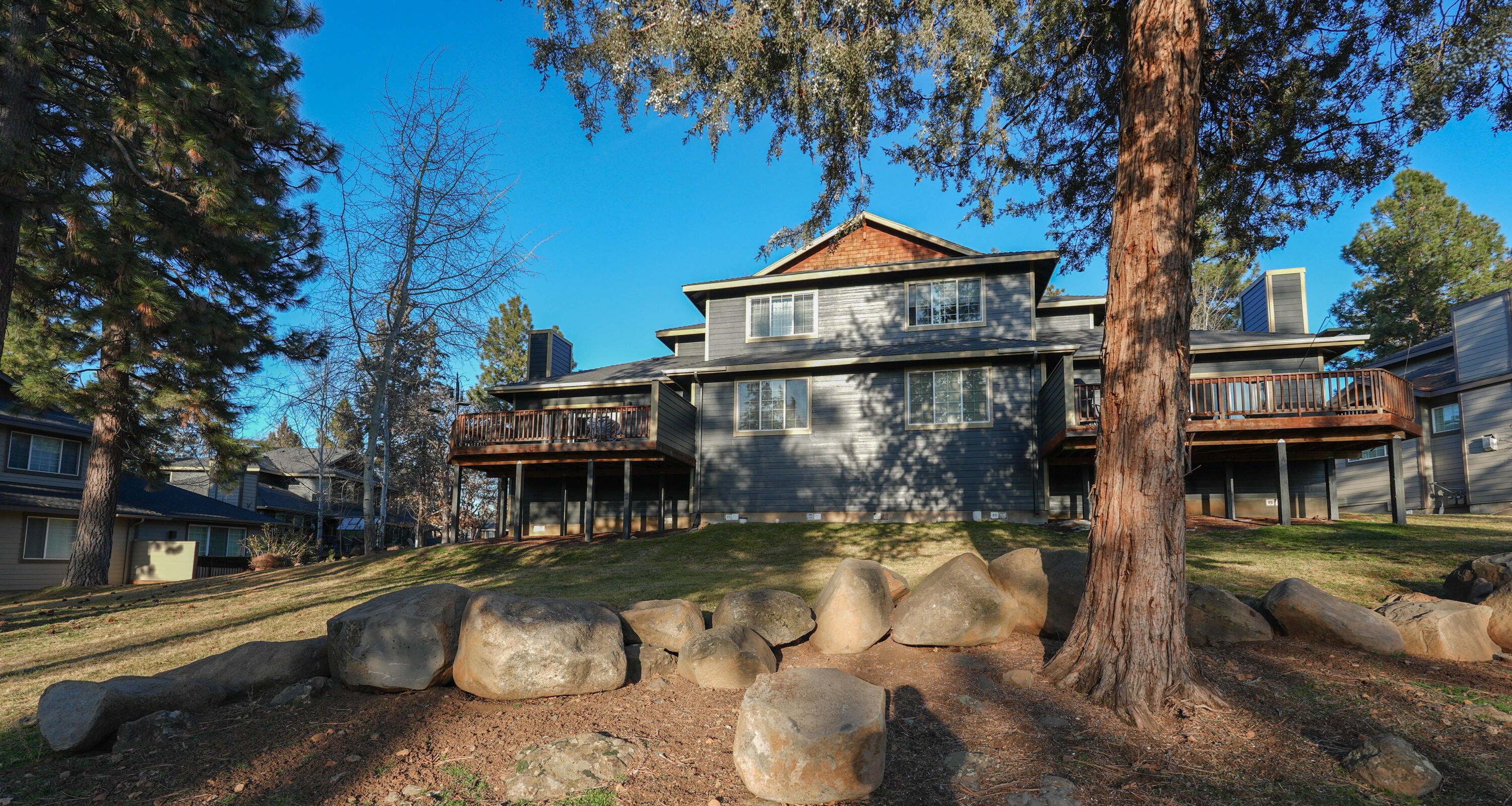 5028 Sora Loop Klamath Falls, OR 97601 - Photo 56 of 62 a front view of a house with yard swimming pool and outdoor seating