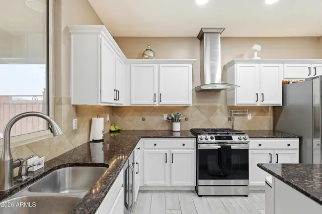 a view of a bathroom from a hallway