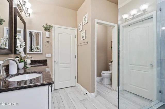 a view of a house with pool and sitting area