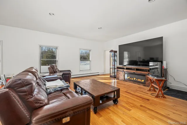 a bedroom with bed and window