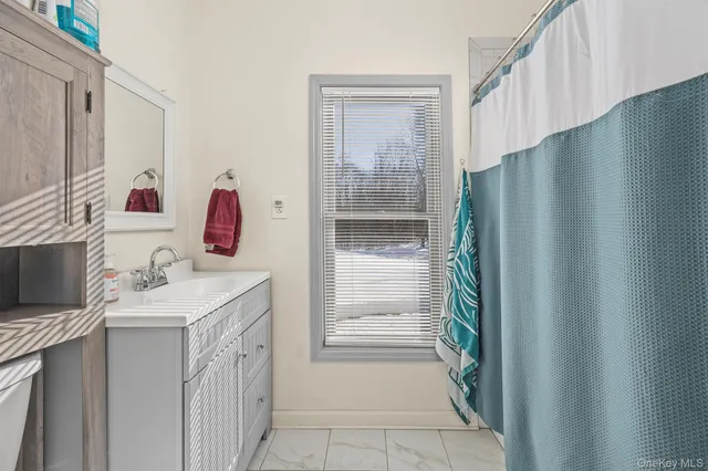 a kitchen with stainless steel appliances granite countertop a stove and cabinets