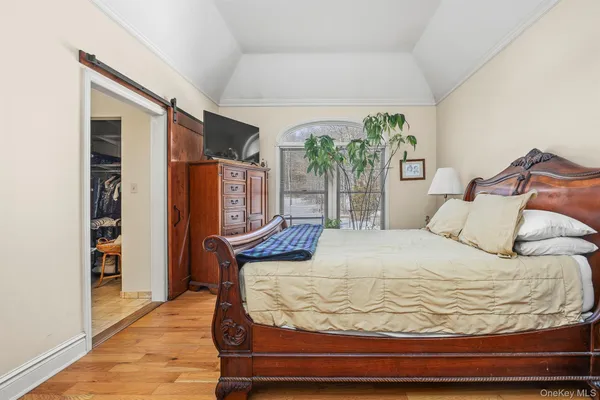 a large kitchen with stainless steel appliances granite countertop a stove and a sink