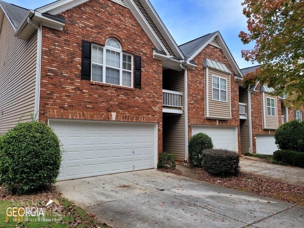 2067 Manhattan Parkway Decatur, GA 30035 - Photo 1 of 1 a front view of a house with a yard