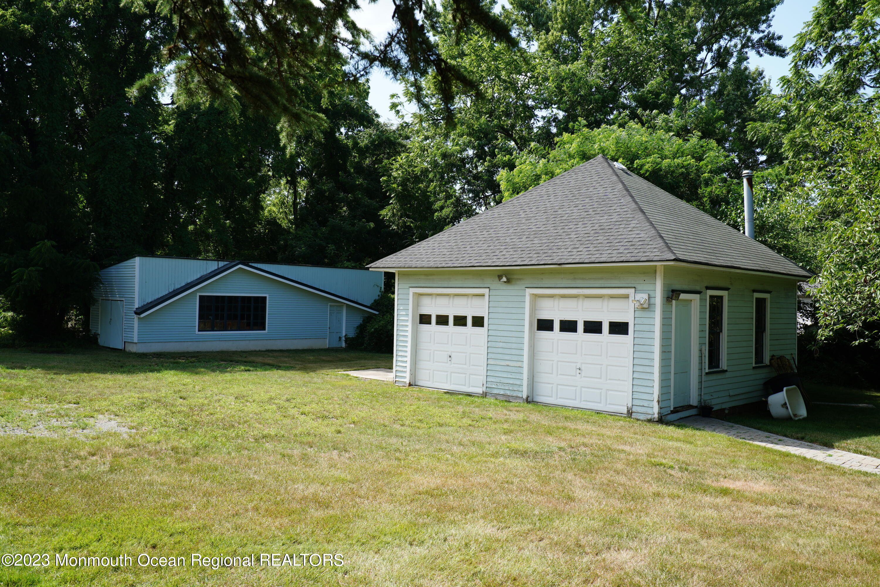 51 Cherry Tree Farm Road Middletown, NJ 07748 - Photo 14 of 62 a view of a house with a yard and large tree