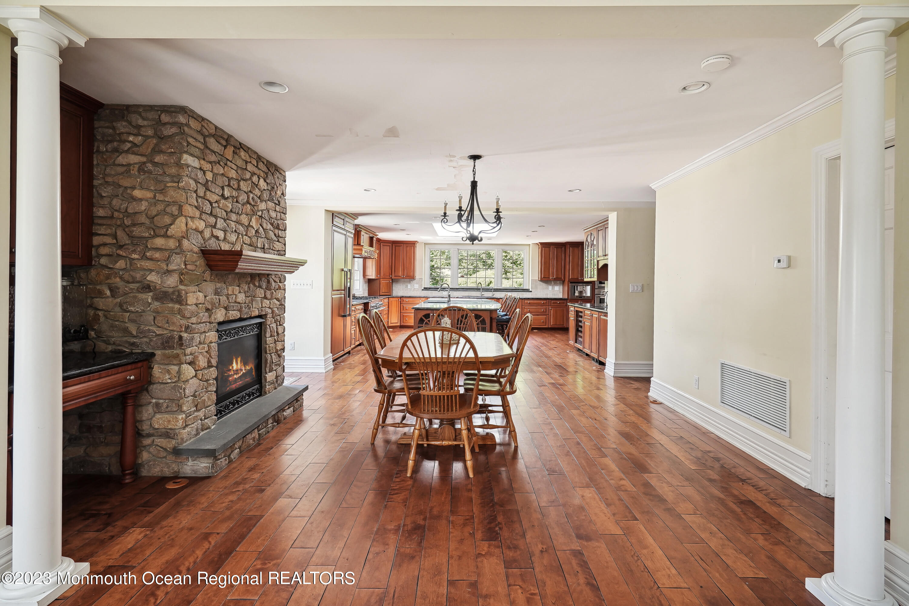 51 Cherry Tree Farm Road Middletown, NJ 07748 - Photo 35 of 62 a dining room with furniture and wooden floor