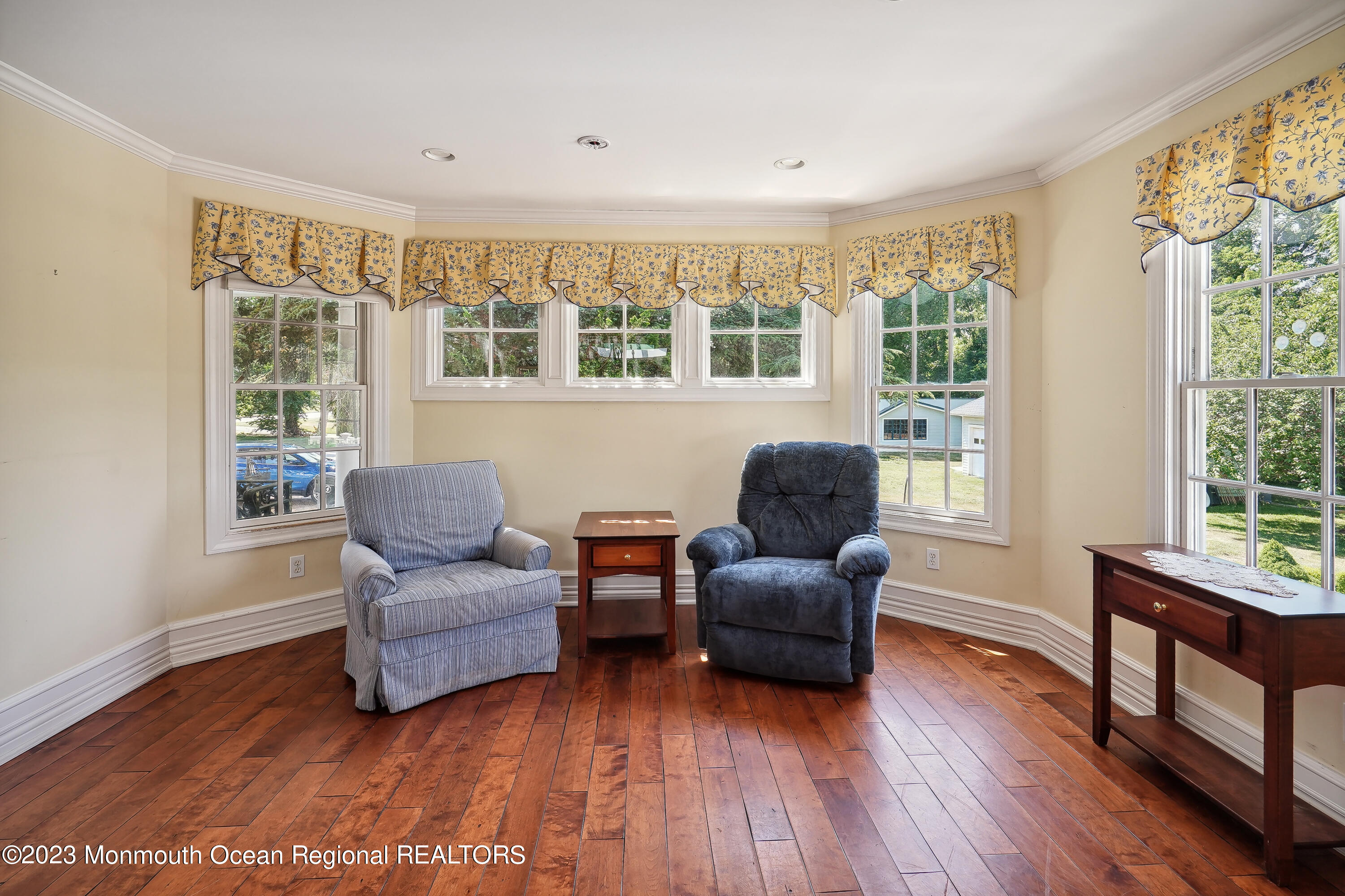 51 Cherry Tree Farm Road Middletown, NJ 07748 - Photo 37 of 62 a living room with furniture and a large window